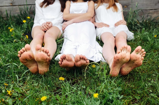 Girls sitting on the grass