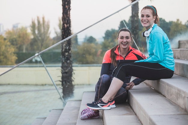 Girls sitting and laughing