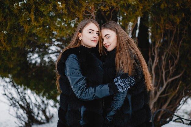 Girls in a winter park