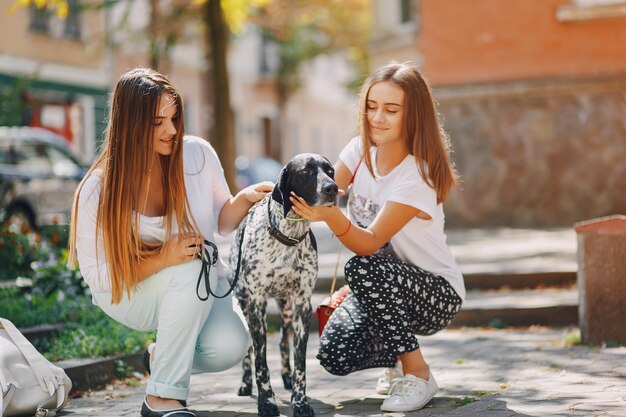 Free Photo girls with dog