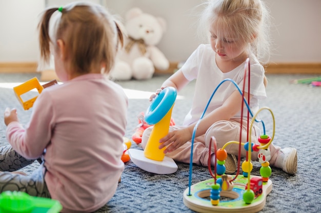 Free photo girls with educational toys