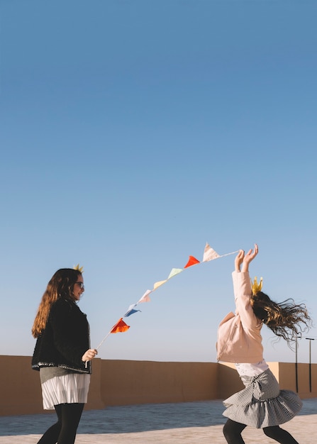 Free photo girls with flag garland