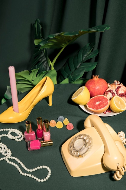 Girly arrangement on table next to tropical plant