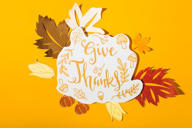 Free photo give thanks lettering on yellow background