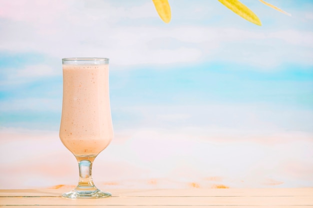 Glass of aromatic nutritious milkshake 