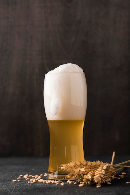 Free photo glass of blonde beer with foam