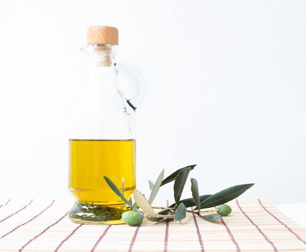 Free photo glass bottle of olive oil.