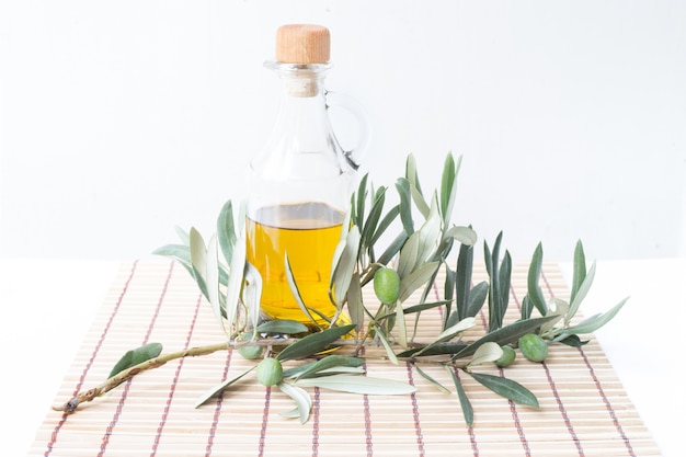 Free photo glass bottle of olive oil.