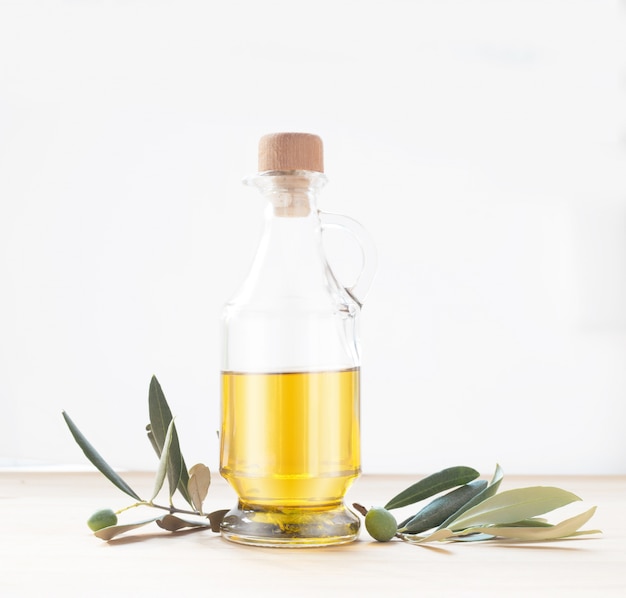 Glass bottle of olive oil.