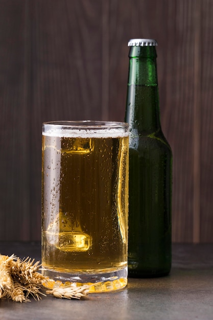 Glass and bottle with beer