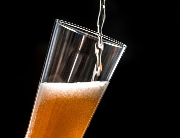 A glass of cold beer macro photography