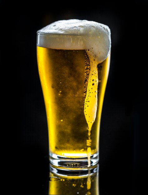 A glass of cold beer macro photography