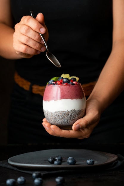 Glass cup of delicious acai brazilian dessert