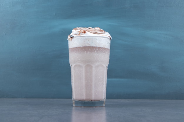 Free Photo a glass cup of sweet milkshake with whipped cream