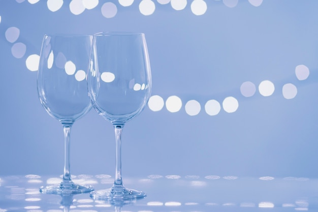 Glasses on light blue background