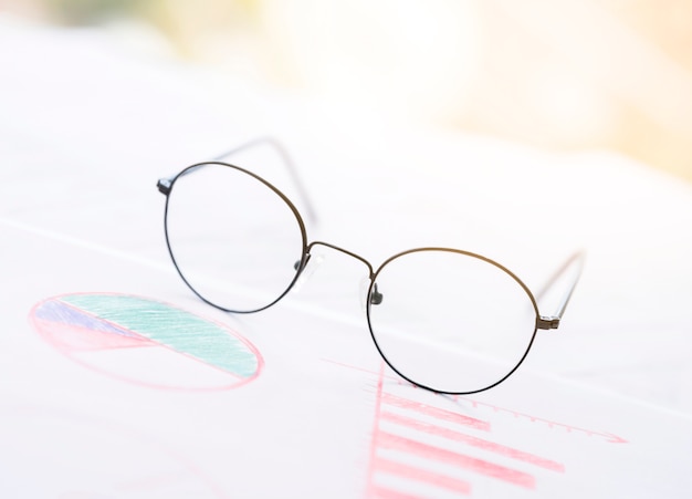 Free photo glasses on a office desktop