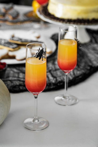 Glasses with halloween juice on table