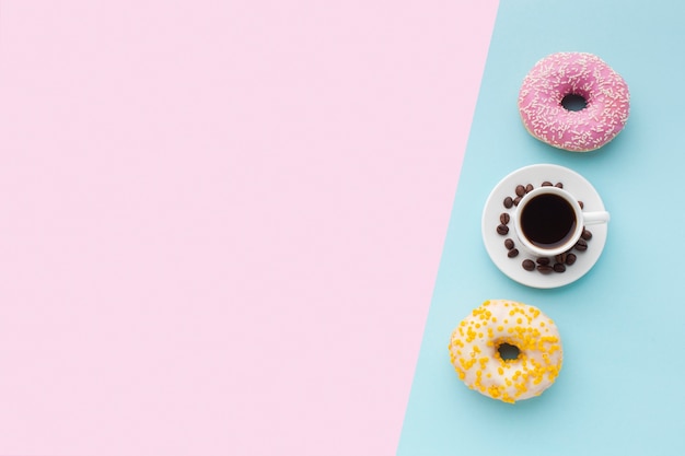 Free Photo glazed donuts with coffee top view