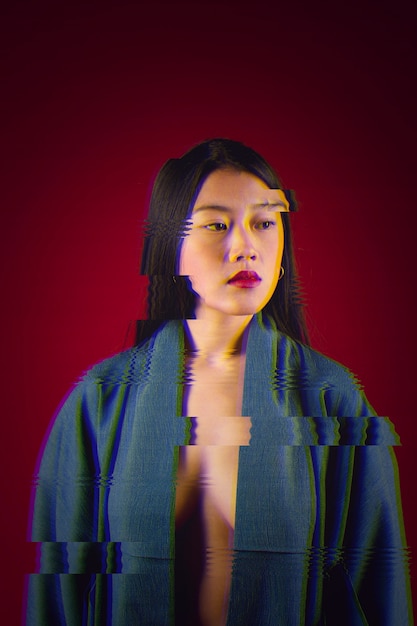 Free Photo glitch effect on portrait of young asian woman