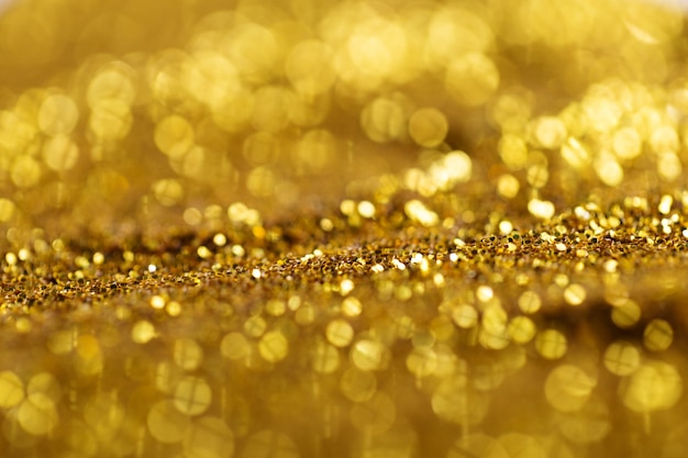 Free Photo glowing gold sparkles in light