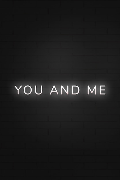 Free photo glowing you and me neon typography on a black background