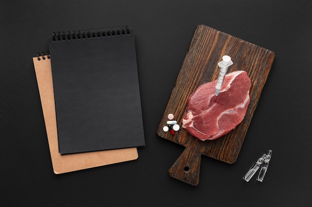 Free photo gmo modified meat flat lay