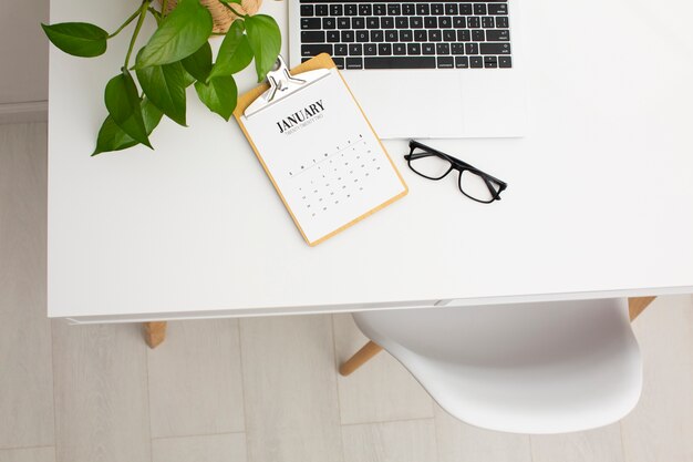 Goal setting concept with desk high angle