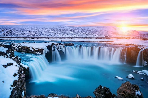 Free photo godafoss waterfall at sunset in winter, iceland.