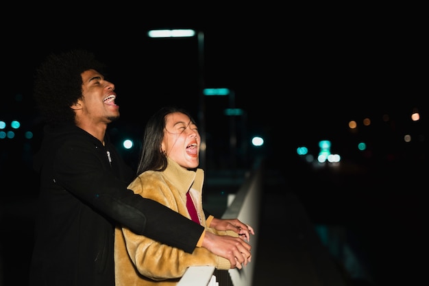 Free photo going out concept with couple at night