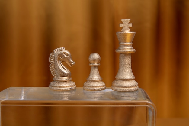 Gold aesthetic wallpaper with chess pieces