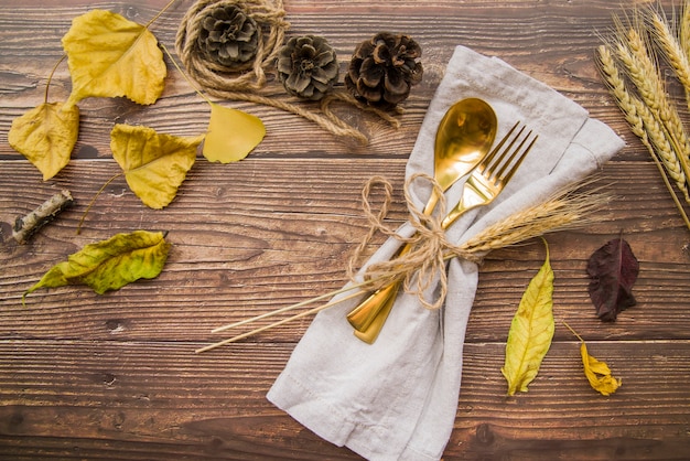 Gold fork and spoon on table