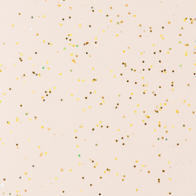 Gold glitter texture beige background