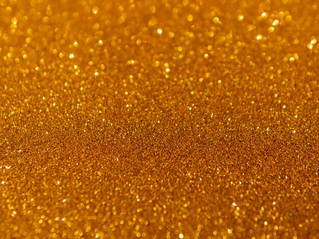 Gold glittery texture background abstract