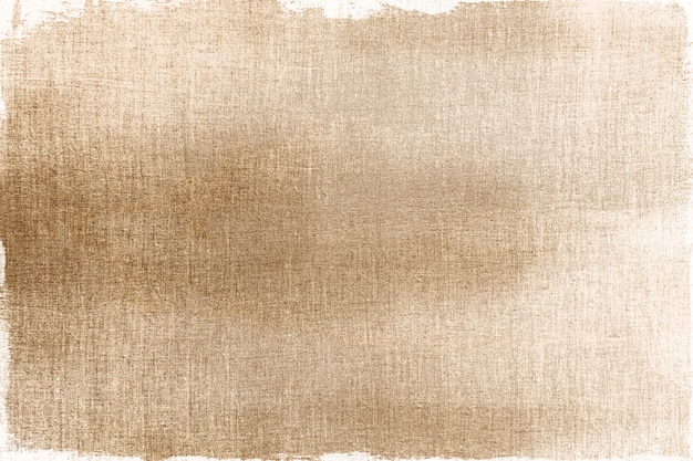 Free Photo gold painted on a fabric textured background