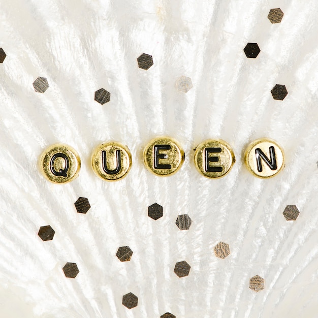 Free Photo gold queen alphabet letter beads