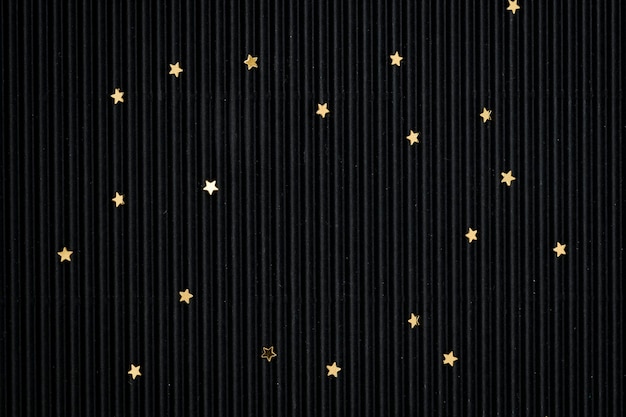 Free photo gold starry glitter black