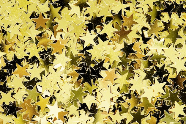 Free photo gold stars patterned background