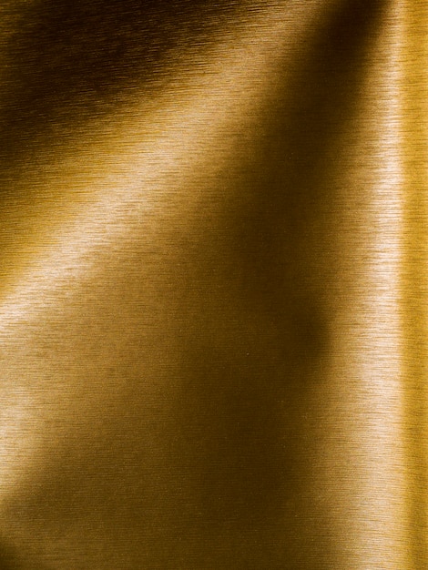 Free photo gold texture background with curves