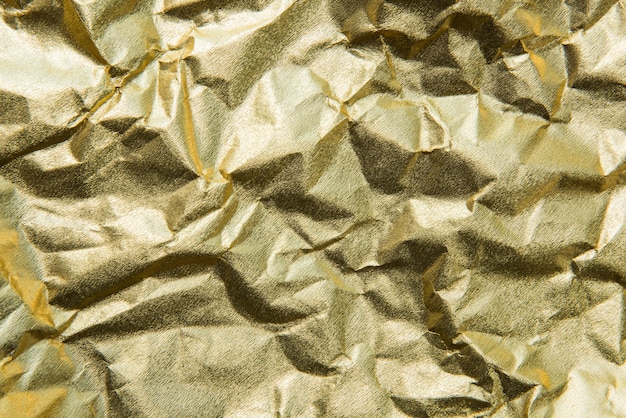 Free photo gold textured background