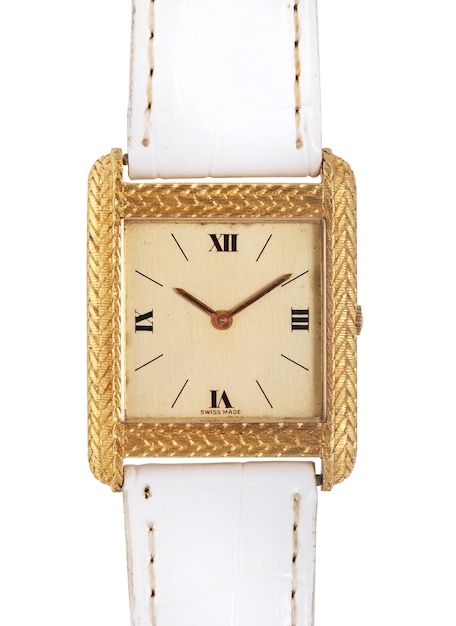 Free Photo gold watch with a white leather band under the lights isolated on a white