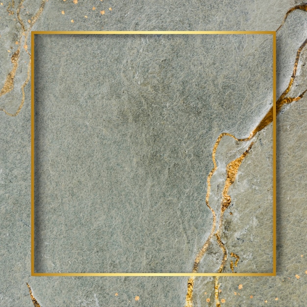 Free Photo golden frame on marbled background