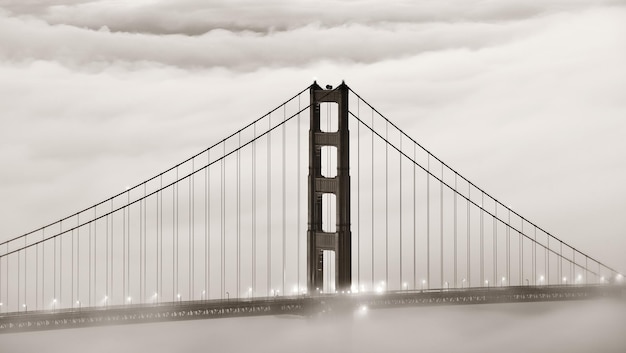 Golden Gate Bridge tower in fog closeup in San Francisco