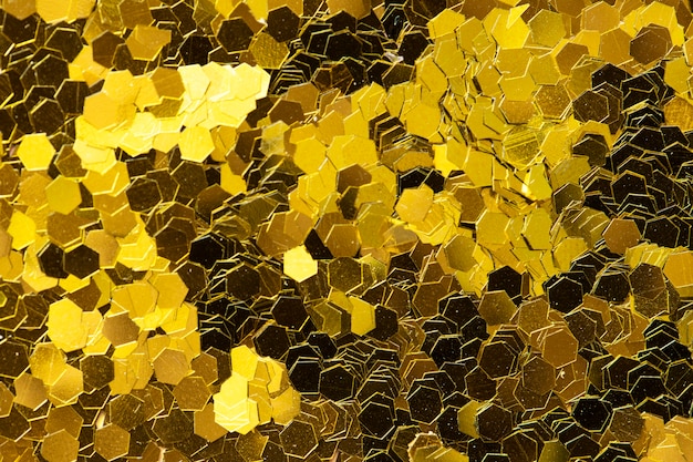 Free Photo golden glitter textured background abstract