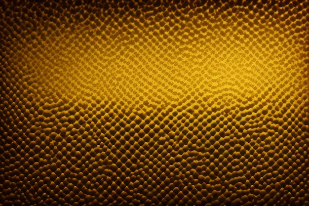 Free photo a golden leather texture that is textured and has a pattern of scales.