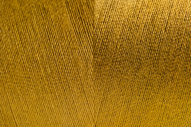 Golden rolled yarn texture background