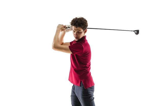 Free photo golf player in a red shirt taking a swing on white studio