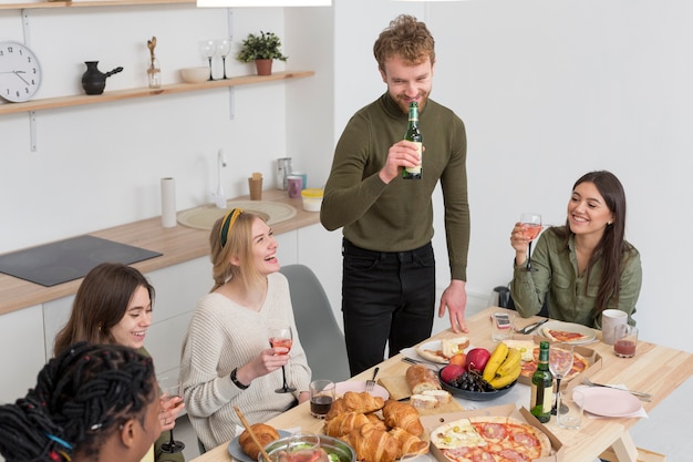 Good friends eating together