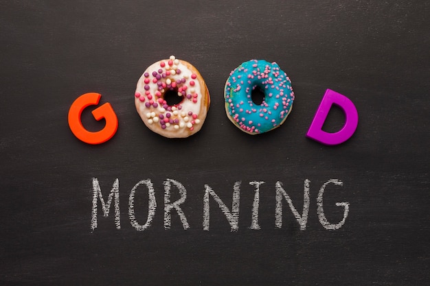 Free photo good morning mesage with doughnuts