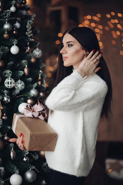 Gorgeous girl with long dark hair with little white dwarf