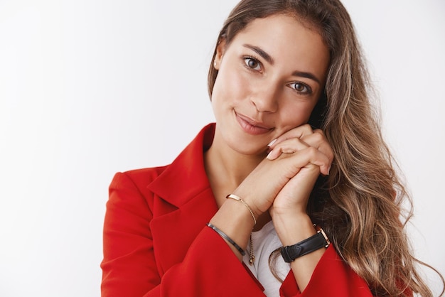 Gorgeous  stylish successful modern businesswoman in red trendy jacket smiling